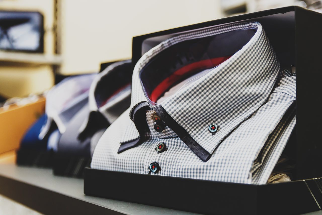 About Set of formal checkered shirts neatly packed in boxes, ideal for business or gift.